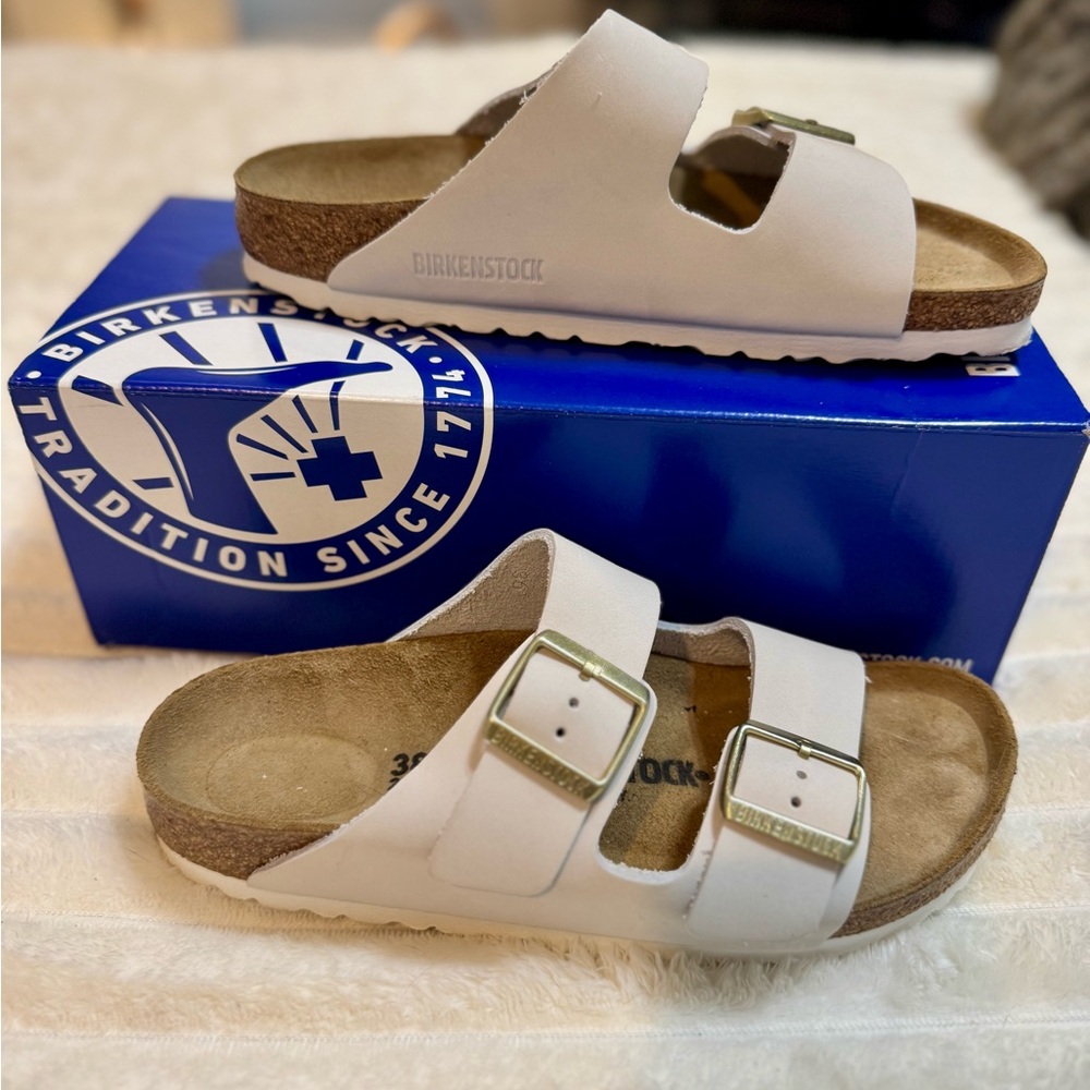 Birkenstock Women's Cream Sandals with Gold Buckles